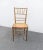 Faux Bamboo side chair , gold painted distressed finish, caned seat