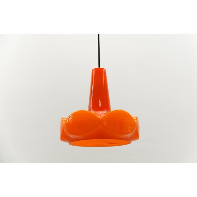 Lovely orange glass ceiling lamp by peill & putzler, 1960s the lowest possible height is 45 cm, and it is continuously...