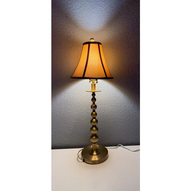 Bring timeless sophistication to your space with this vintage Mid-Century Modern Ralph Lauren desk lamp. Featuring an...
