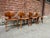 This set of four DCW (Dining Chair Wood) chairs was designed by Charles & Ray Eames and produced by Herman Miller in the...