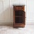 A French bedside table (chevet) in the Louis-Philippe style, made around 1870. The tall rectangular form with chamfered...