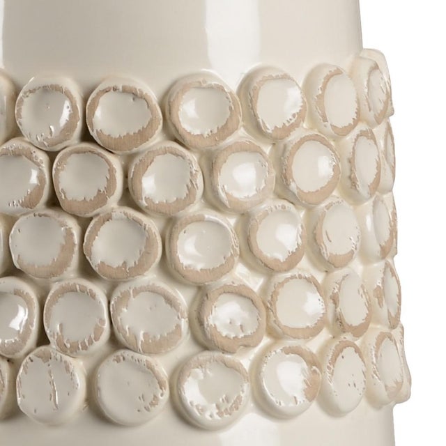 Dress up your decor with this hand sculpted, aged cream glazed italian ceramic. A tapered cream silk shade mimics the...