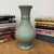 "About This Piece About This Piece Timeless refinement meets natural serenity in this celadon green vase, finished with a...