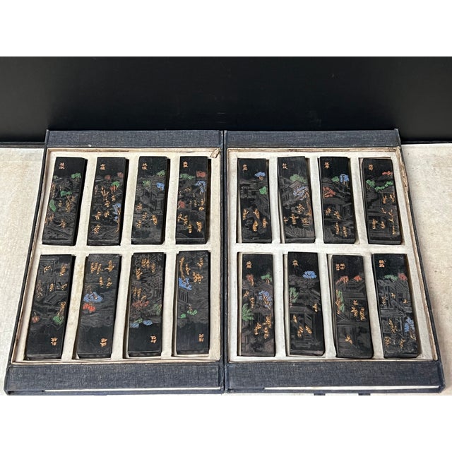 ITEM NAME: Set of Sixteen Chinese Art Calligraphy Black Ink Sticks with Landscape And Poem Decoration with Silk Box...
