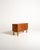 Mid-twentieth-century Scandinavian teak sideboard with two doors, four slanted drawers, and a base with square legs. Mid-...