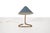 Nice table or desk lamp which can also be hung on the wall as a wall lamp. This lamp was designed by Erik Wärna and...