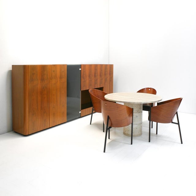 This 1970s italian wall cabinet with curved edges exists of four units: - a double door cabinet with two adjustable glass...