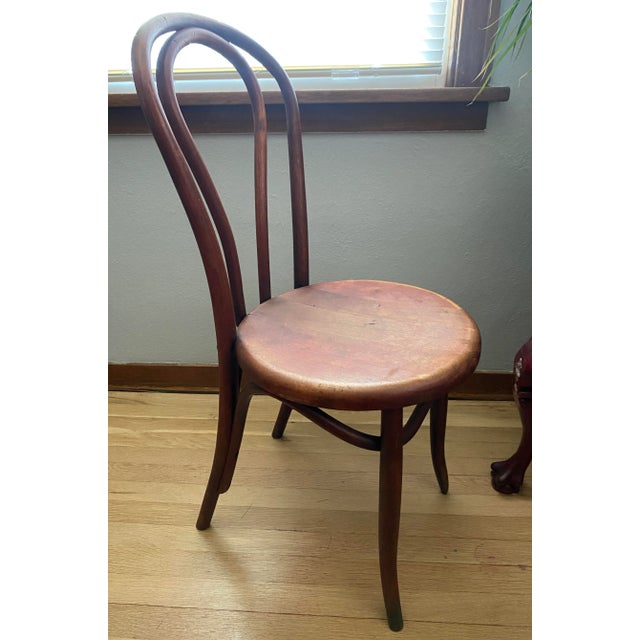 A beautiful antique bentwood chair from the Sheboygan Chair Company of Wisconsin, USA. The original tag under the seat...