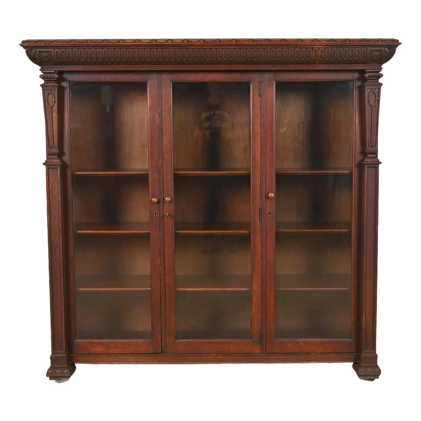 R. J. Horner Style American Empire Carved Oak Glass Front Triple