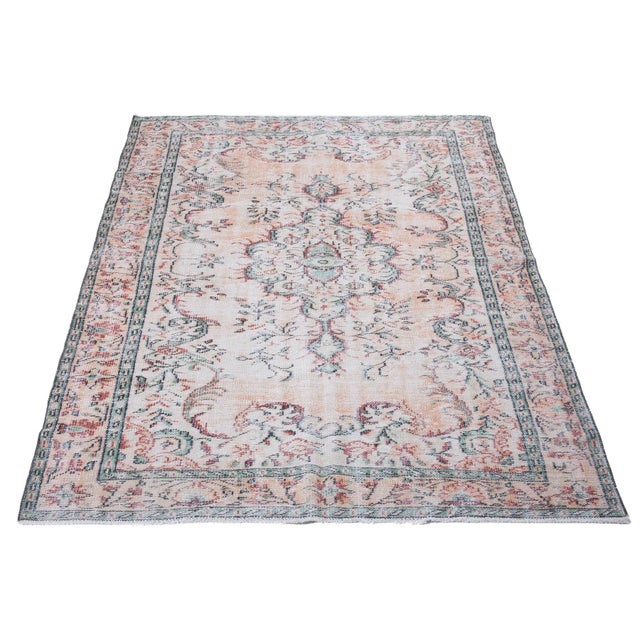 Vintage handknotted rug from Oushak region of Turkey. Approximately 50-60 years old. In very good condition.