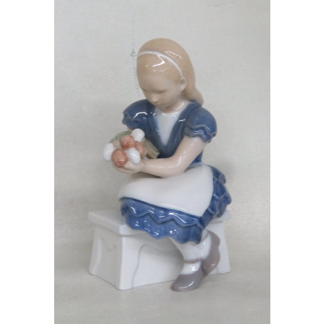 This charming Figurine is made of porcelain. This adorable piece was is stamped as being made by Bing & Grondahl in...