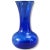 This is a stunning cobalt blue glass vase made by Indiana Glass. The vase features an "Illusions" pattern, a light swirl...