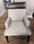 Michael Weiss Phelps Side and Arm Chairs. 2 arm chairs and 8 side chairs. Fabric natural color with leather top and...