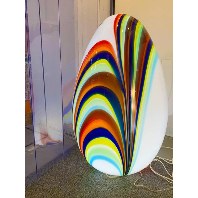 Contemporary white egg lamp in murano glass with multicolored reeds fused together. Glass rods create spectacular and...