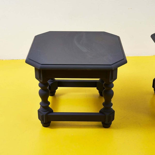 Add a touch of class to your space with this refined set of coffee tables. Their octagonal shape and glossy black finish...