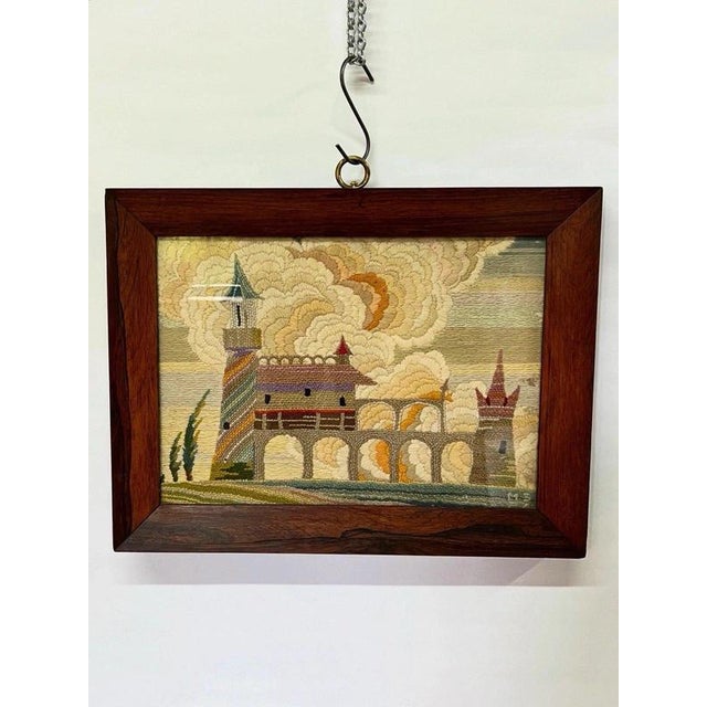 Folk Art Textile Landscape with Castle, circa 1930s Material: Textile, Embroidery, Hardwood A beautifully executed British...