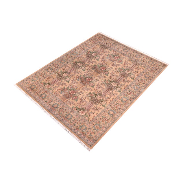 Designed with mesmerizing intricacy and gorgeous color palette, this hand-knotted masterpiece demonstrates the beauty and...