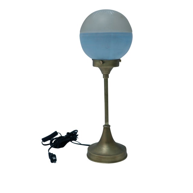 A stunning pair of Deco period European art glass shades. The globe shades feature a pale blue bottom half and a frosted...