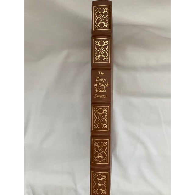 This is a Vintage Collector’s Edition Volume of THE ESSAYS OF RALPH WALDO EMERSON with Leather Cover and consisting of 262...