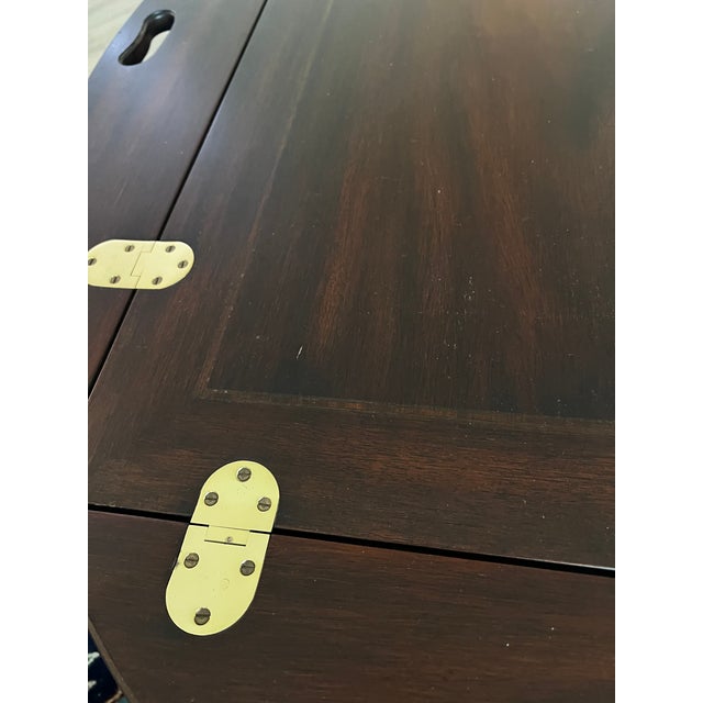 Henkel Harris butler's coffee table in solid mahogany with #29 finish. A Chippendale style butler's tray coffee table by...