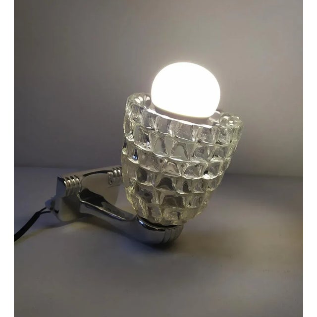 This Wall light is attributed to Barovier for form and style. This piece is attributed to the mentioned designer/maker. It...