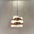 Vintage chandelier by Stilux Milano, designed in the 1960s. Frame made of brown and white acrylic rings. Excellent vintage...