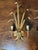 Rare and elegant Cattail Gilt Hollywood Regency Sconces. These sconces are sought after collectors items and have seen a...