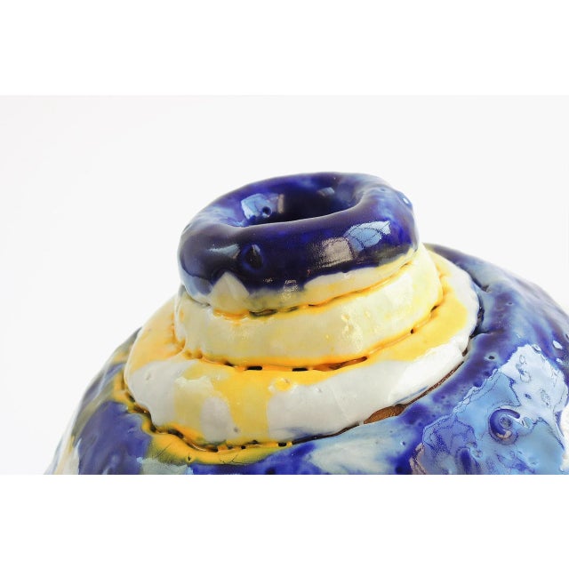 The expressive ymono vase, with cracked shino glaze and decor through mounting technique, is a real statement piece for...