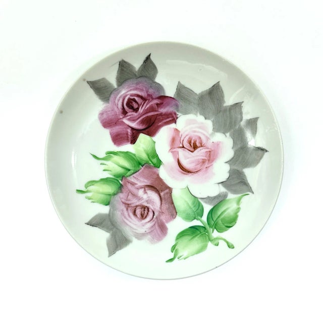 Mixed rose pink and white decorative plates, group of 9. This beautiful set of decorative plates comes in a variety of...