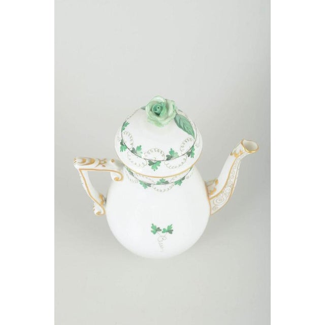 Herend, Hungary Mocha pot with lid, mid-20th century. Elegant porcelain pot with hand-painted green leaf decoration and...