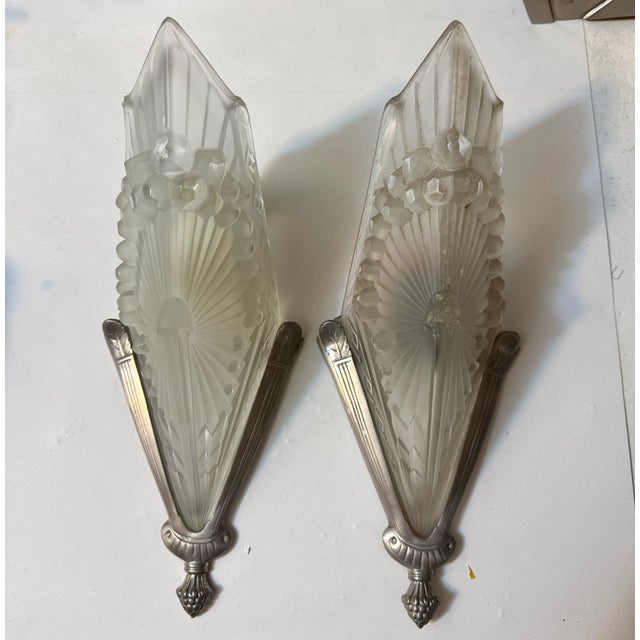 Pair of French Art deco sconces signed by the French artist Charles Schneider. Each shade is signed Schneider France...