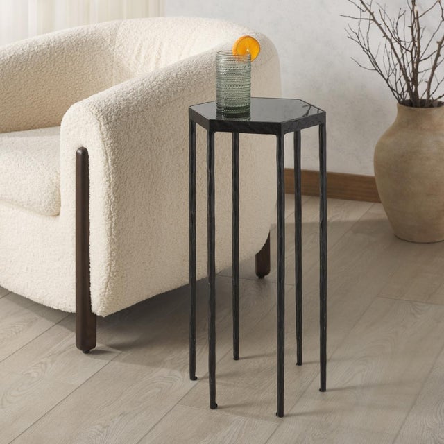 Introducing the Galvin marble top drink table in black on black. This exquisite piece brings together sleek design and...