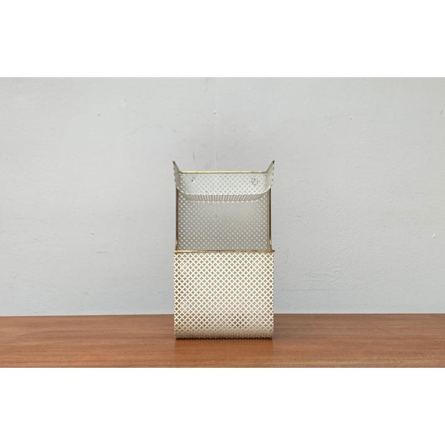 Mid-Century Perforated Metal Shelf, 1950s, in Very Good conditions. Designed 1950 to 1959