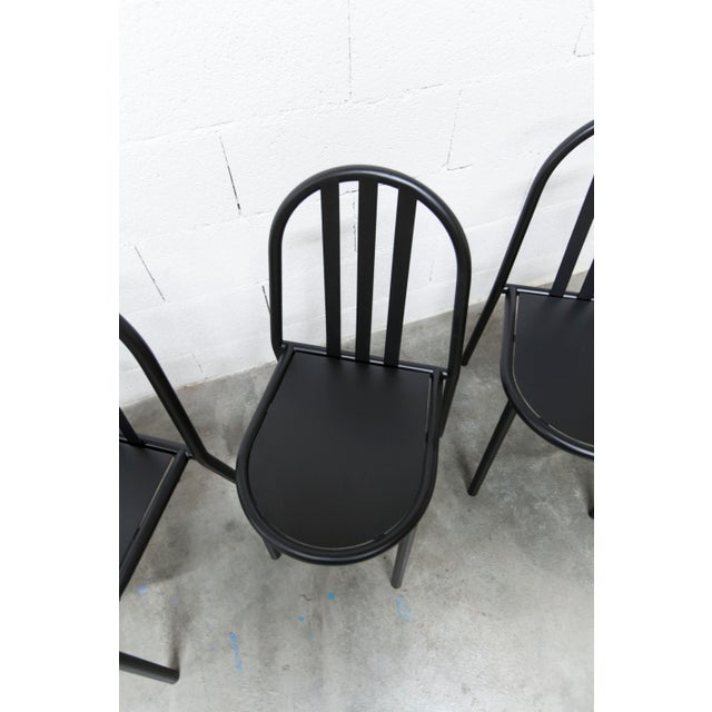 Set of six Model 222 chairs designed in the 1920s by Robert Mallet-Stevens. This chair was produced from the 1980s...