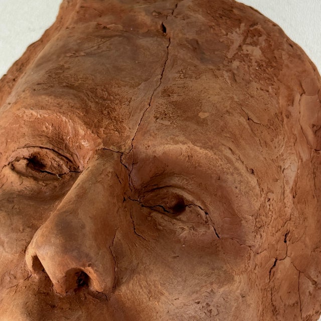 A lovely studio sculpture of a face of a man. Very solemn and at peace with himself. Great attention is paid to its...