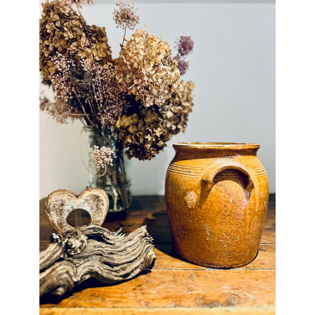 Early 20th Century French Stoneware Confit Pot A French stoneware “grès vernissé” confit pot with traditional mottled...
