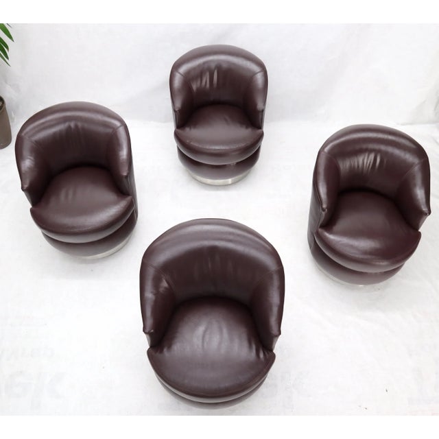 Set of 4 Mid-Century Modern high quality leather upholstery chairs on 6 six heavy duty brass finish castors. They easy...