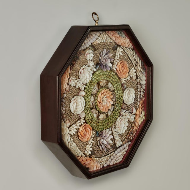 Enchanting vintage sailors valentine handcrafted in exotic seashells lovingly arranged in intricate floral designs....