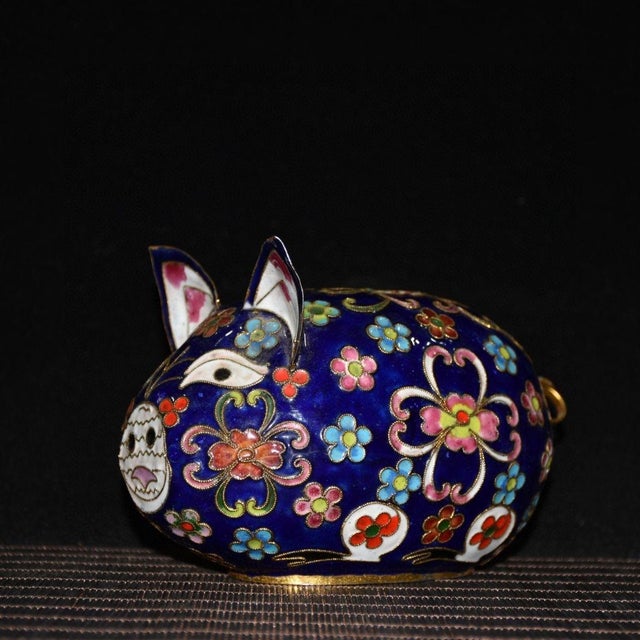 This adorable cloisonne pig figurine is handcrafted with fine copper wire inlay. It features a striking deep cobalt blue...