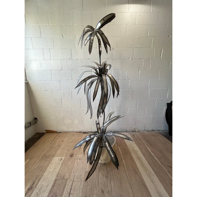 Striking vintage 1970s American Brutalist botanical floor sculpture, handcrafted from individually formed and welded metal...
