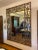ENORMOUS ANTIQUE Gilded Iron Wall Mirror... a truly exceptional statement mirror crafted nearly 100 years ago. In near...
