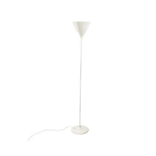 A 1960s torchiere floor lamp designed by the Swiss artist and designer Max Bill (1908-1994). This white lamp features a...