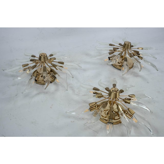 Stunning set of three mid-century modern ceiling lamps crafted in Italy during the 1970s. Featuring a sophisticated design...