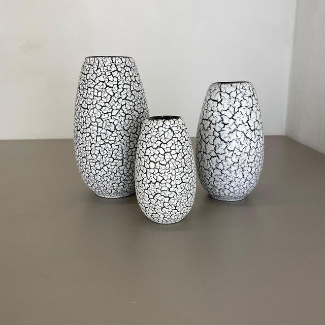 Article: Set of three fat lava art vases Producer: Jasba Ceramics, Germany Decade: 1970s These original vintage vases was...