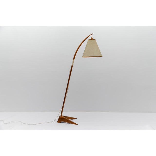 A great, geometrically shaped Domus wooden hanging lamp. We have the matching hanging lamp in our shop. Executed in rattan...