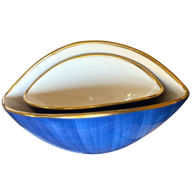 A striking pair of hand-painted porcelain bowls from L’Objet’s iconic Circe collection, dated 2005 and crafted in...