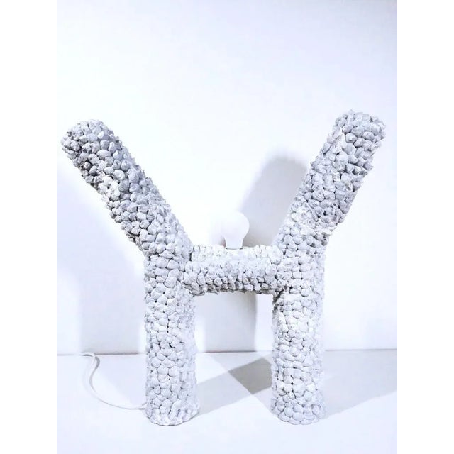 H sculpted lamp by Johan Destrumelle. Unique piece, handmade in foam and concrete. Dimensions: 60 x 60 x 10 cm. Johan...