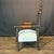 Wonderful antique child’s armchair featuring an intricately turned wood frame with tall finial-topped posts, a spindle...