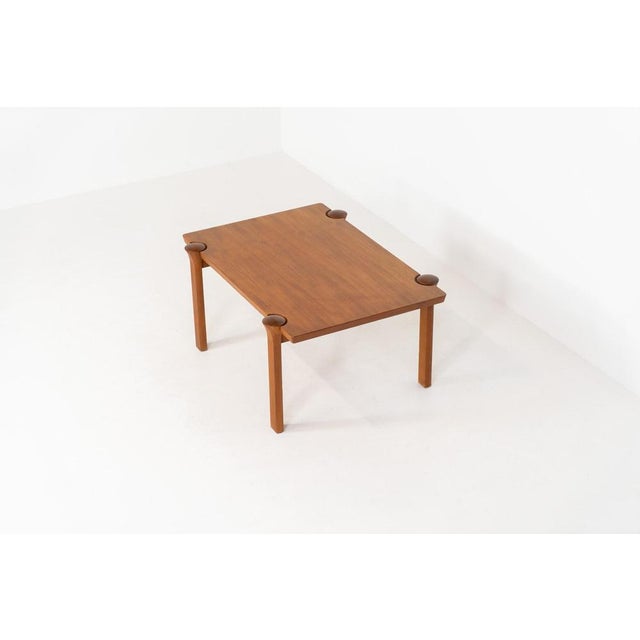 Stunning sculptural coffee table by Arne Vodder for Cado (Denmark, 1960s). A beautifully crafted coffee table made from...
