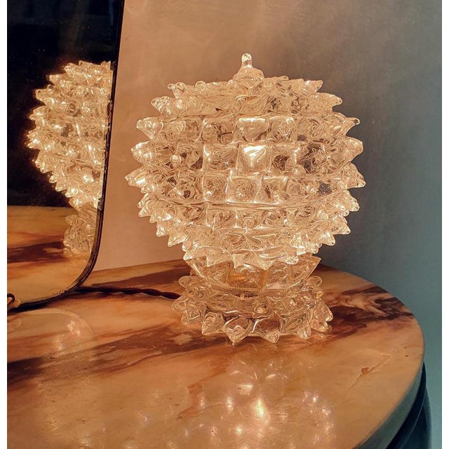 A pair of cute table lamps designed and produced by Barovier & Toso from the 1940's in rostrato Murano glass. Easy to...